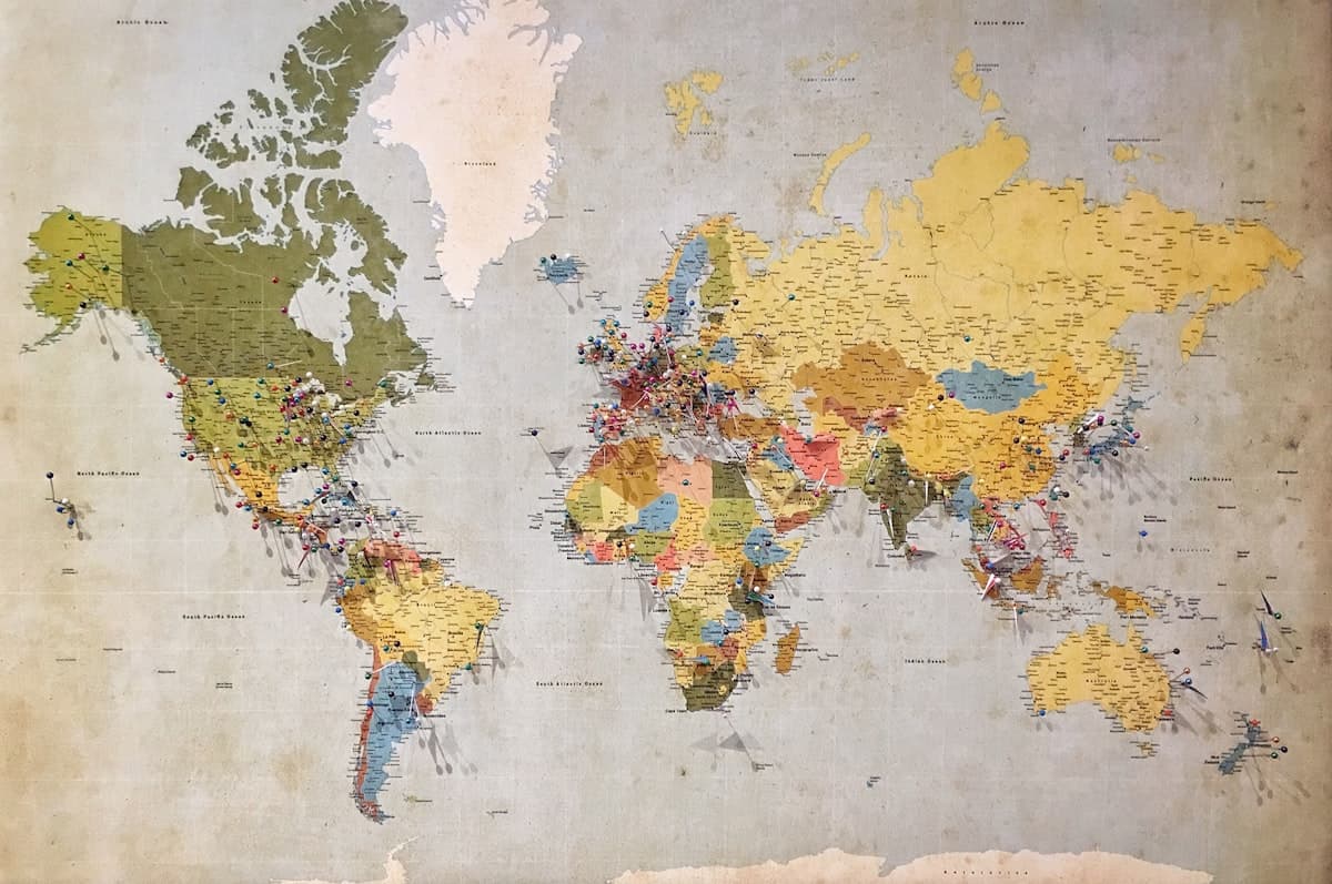 World map with pins marking international destinations